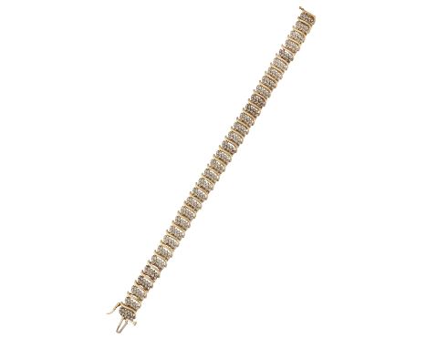 A DIAMOND BRACELET, set with links comprised of two rows of small round brilliant cut diamonds, set in white metal with yello