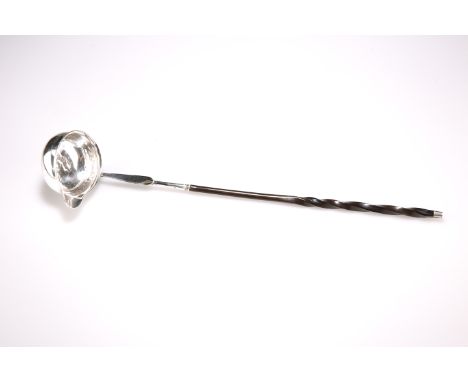 AN 18TH CENTURY SILVER TODDY LADLE, with baleen handle, one indistinct mark. 34cm