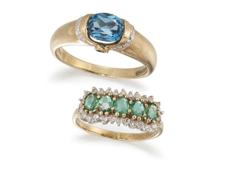 TWO GEMSET RINGS, the first a 9ct blue topaz and white hardstone ring, size R; together with a five stone emerald and diamond