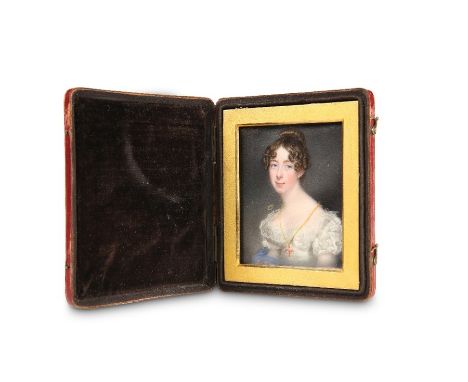 A GEORGE III PORTRAIT MINIATURE, depicting a lady wearing a gold chain with jewelled cross pendant, dated 1781 and monogramme