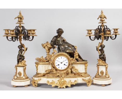 A GOOD 19TH CENTURY FRENCH THREE PIECE CLOCK GARNITURE, the clock ormolu and marble with a classical bronze reclining figure,