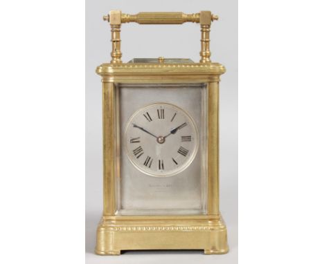 A GOOD 19TH CENTURY  FRENCH REPEATER CARRIAGE CLOCK, retailed by EDWARDS & SON, GLASGOW. 7ins high.