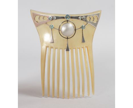 A GOOD HORN COMB in the Art Nouveau manner with silver and pearl mounts.