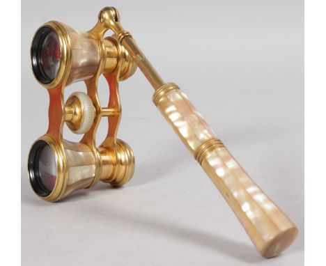 A SET OF EDWARDIAN GILT AND MOTHER-OF-PEARL OPERA GLASSES.