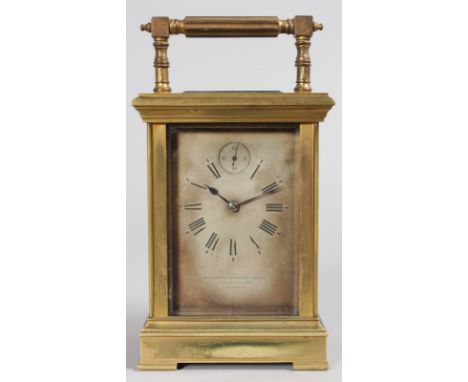 A GOOD 19TH CENTURY FRENCH BRASS CARRIAGE CLOCK with silvered dial, retailed by GOLDSMITHS & SILVERSMITHS CO., 112 REGENT STR