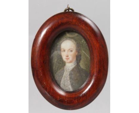 A SMALL OVAL PORTRAIT OF A LADY. 2ins x 1.5ins.