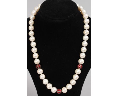 A STRING OF THIRTY-EIGHT PEARLS with red enamel section.
