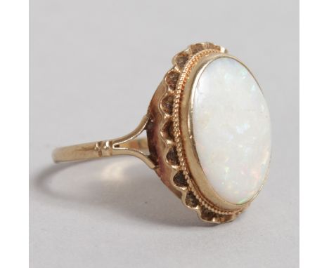 A LARGE GOLD MOUNTED PEARL RING.