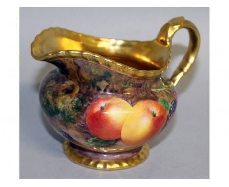 A ROYAL WORCESTER FRUIT PAINTED GADROON BORDERED CREAM JUG, signed by M. Tandy, black mark.