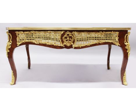 A GOOD LINKE MODEL PARQUETRY TOP COFFEE TABLE with ormolu mounts, metal grilled sides and supported on curving legs. 3ft 6ins