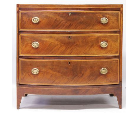 A GOOD GEORGE III MAHOGANY BOWFRONT CHEST OF DRAWERS, with inlaid decoration, three graduated long drawers on delicate bracke