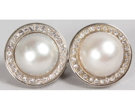 A GOOD PAIR OF LARGE PEARL AND DIAMOND EARRINGS in yellow gold.