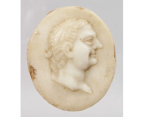 A CARVED ROMAN MARBLE OVAL PORTRAIT PLAQUE. 2.25ins x 1.75ins.
