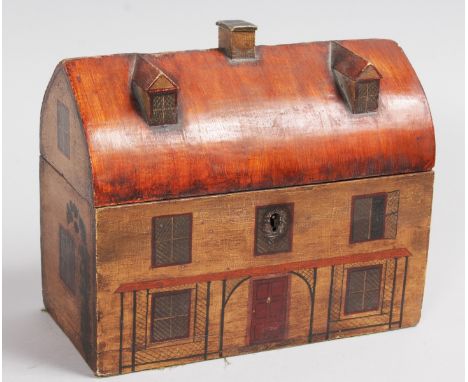 A GEORGIAN PAINTED WOOD HOUSE TEA CADDY with shaped domed top, painted door and windows. 9.5ins long, 8ins high.