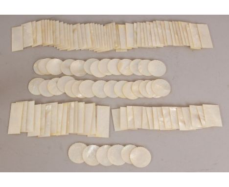 A COLLECTION OF APPROX 117 EARLY 19TH CENTURY CHINESE EXPORT MOTHER-OF-PEARL GAMING COUNTERS, each with a serrated edge, the 