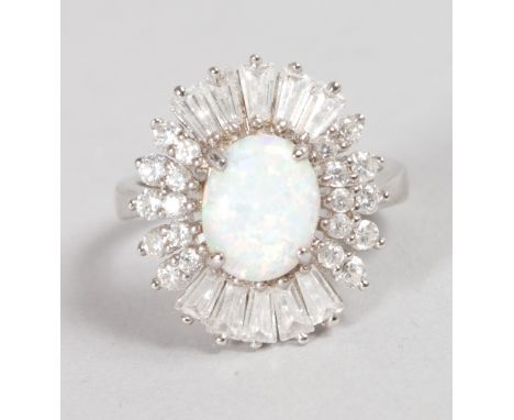 A NICE SILVER, GILSON OPAL AND BRILLIANT SET DRESS RING.