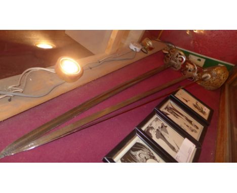 A 1822 Light Cavalry Officers Sabre. Blade pitted with proof mark. Shagreen grip and wiring. No scabbard (af), and a 1827 Pat