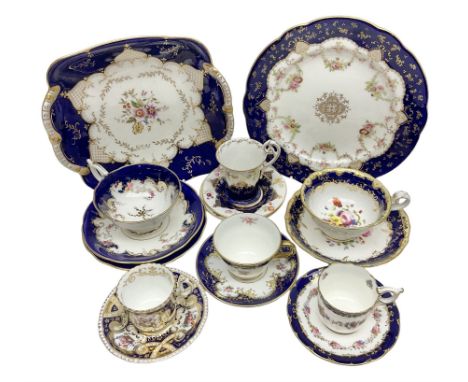 Coalport cobalt blue tea wares, finely decorated in gilt and enamel with foliate motifs and floral sprays throughout, to incl