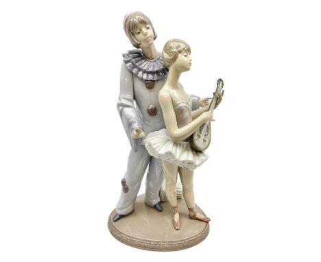 Lladro figure, Minstrel's Love, modelled as a couple entertaining, the lady in ballerina costume playing the lute and the gen