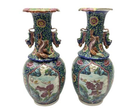 Pair of 19th century clobbered Chinese Export vases, each with lobed rim and applied twin temple lions and dragons to the wai