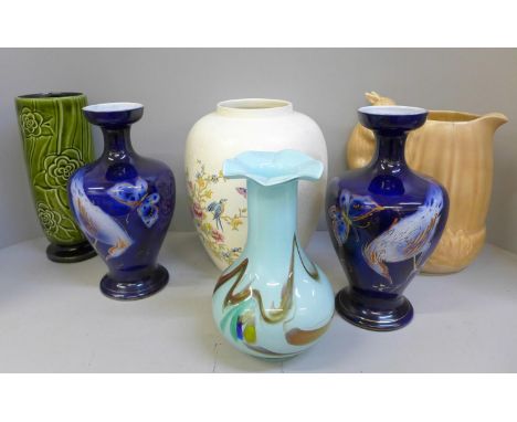 A Poole Pottery vase, a Sylvac squirrel jug, hairline crack to rim, a Sylvac celery vase, blue glass vase and a pair of Troy 