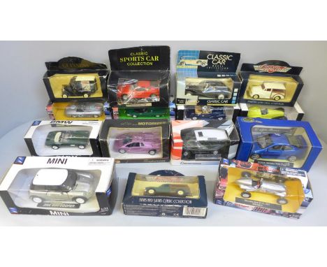 Fifteen boxed die-cast model vehicles 