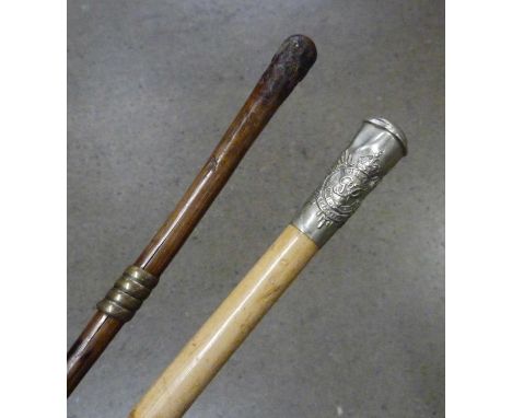 Two swagger sticks; one George VI Army Service 