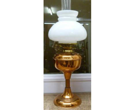 An oil lamp with copper base 