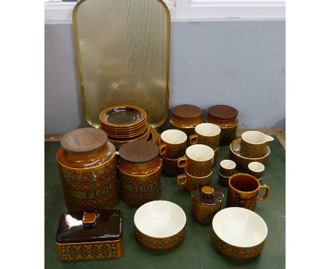 A collection of Hornsea including dinner wares, storage jars, a butter dish, a milk jug, cups, saucers, dinner plates, side p