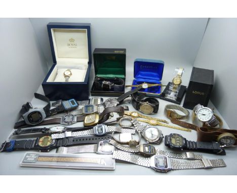 A collection of lady's and gentleman's wristwatches, LCD, quartz and manual wind, also cases and bracelets 