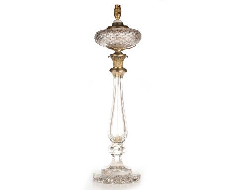 A HANDSOME 19TH CENTURY CUT-GLASS OIL LAMP with prism-cut squat reservoir supported on a hexagonal baluster stem issuing from