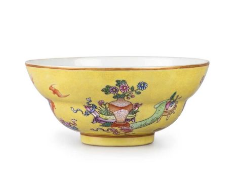 A CHINESE YELLOW-GROUND BOWL the double-domed bowl enamel painted with precious objects, bears underglaze blue seal-type mark