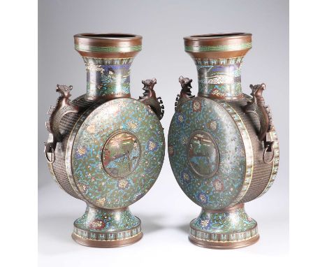 A MASSIVE PAIR OF CHINESE CLOISONNE ENAMEL MOON FLASKS, PROBABLY 19TH CENTURY each with dragon-form handles to the shoulders,