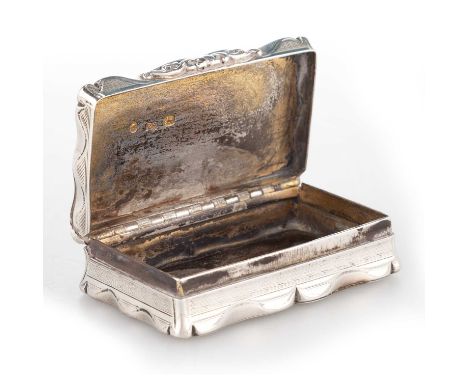 A VICTORIAN SILVER SNUFF BOX by Edward Smith, Birmingham 1859, shaped rectangular form, engine-turned decoration to all sides