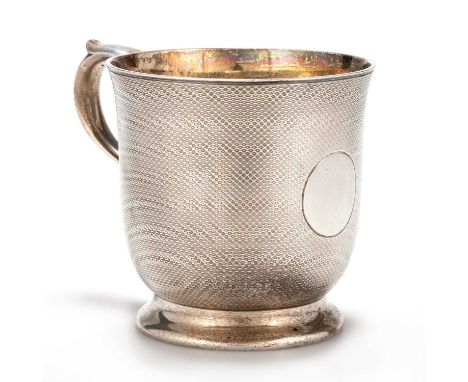 A VICTORIAN SILVER MUG by Edward &amp; John Barnard, London 1864, with engine-turned snakeskin ground, scroll handle, gilded 