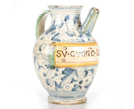 A MONTELUPO MAIOLICA WET DRUG JAR, LATE 16TH OR EARLY 17TH CENTURY of typical form with a loop handle and spout, decorated wi
