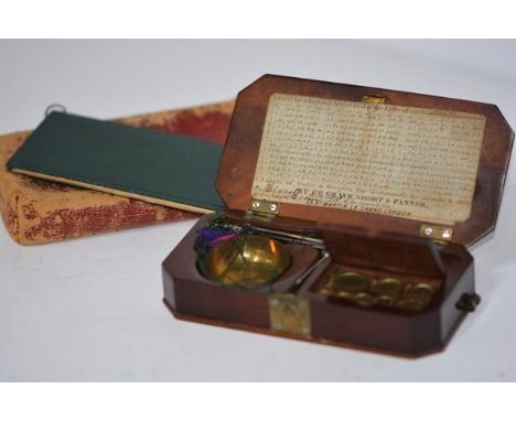 A set of mid-19th century pocket diamond scales, De Grave, Short & Fanner, 59 St. Martin le Grand, London, the mahogany case 