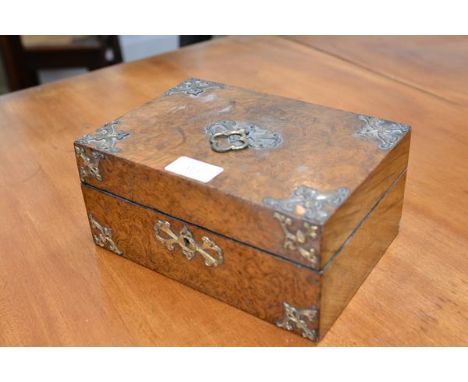 A mid-19th century gilt-brass mounted burr walnut jewellery box, of rectangular form, with pierced scroll-cast mounts and sha