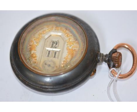 A late 19th century Systeme Brevete gun-metal mounted digital display pocket watch, probably Swiss, the dial signed G.T., the