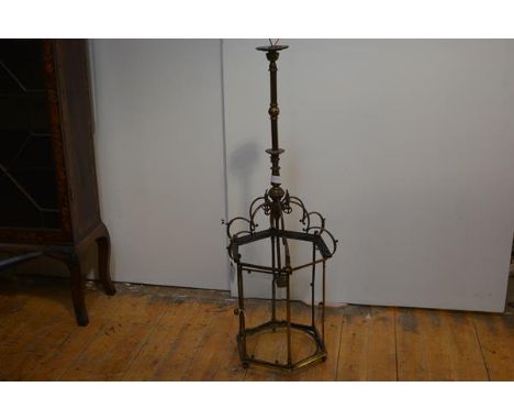 A good 19th century gilt-brass hanging hall lantern, of hexagonal form, with columnar uprights enclosing bevelled glass plate