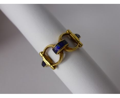 A Lady's 18 ct Yellow Gold and Enamel Stirrup Ring.