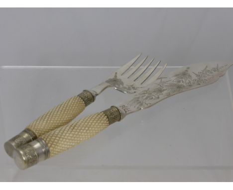 An Ivory Handled Fish Slice and Serving Fork, with marks to the fish slice.