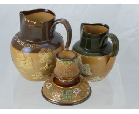Two Doulton Lambeth Ware Pottery Jugs, including a Poole & Anderson 'Old Scotch Whisky' Jug approx 17.5 cms and a Dewar's Whi
