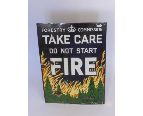 An Enamel Public Notice Sign, for the Forestry Commission "Take Care Do Not Start Fire" approx 38 x 54 cms.