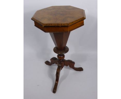 A Octagonal Walnut Veneer Sewing Table, decorative inlay and contents, carving to turned supports and legs, approx 43 x 45 x 