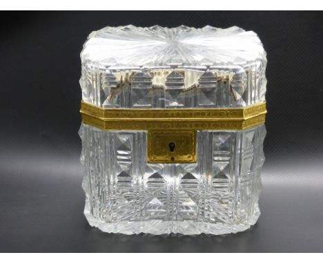 An Antique French Cut Crystal and Ormulu Sugar Caddy, with star burst design to base and lid, approx 11.5 x 8 x 9 cms.