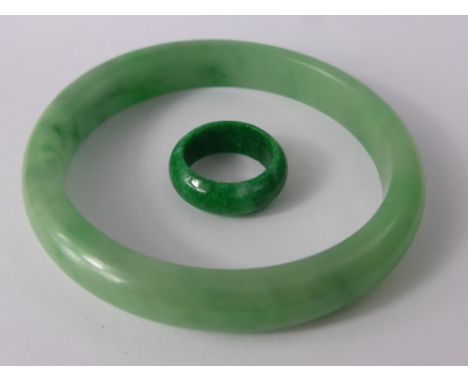 An Apple Green Jade Bracelet together with a bright green jade ring, bangle 70 mm, ring 20 mm.