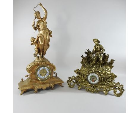 A 19th century French spelter figural mantel clock, 66cm high, together with another