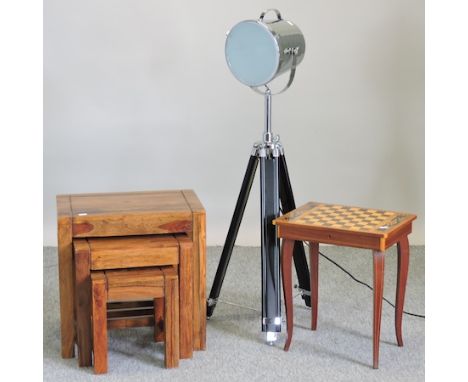 A reproduction chrome stage light, together with a nest of three hardwood occasional tables, 45cm, and a games table