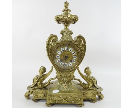 An early 20th century continental brass cased mantel clock, 40cm high